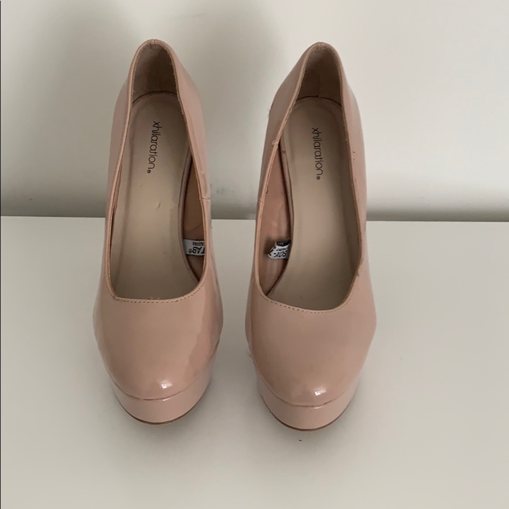 Nude, patent leather heels
